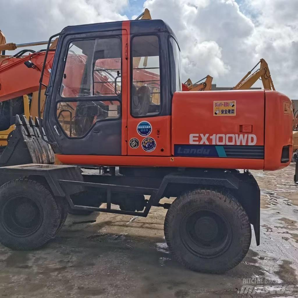 Hitachi EX 100 W D حفارات بعجل