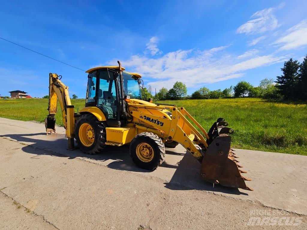 Komatsu WB 93 R لوادر ذات جرافات عكسية