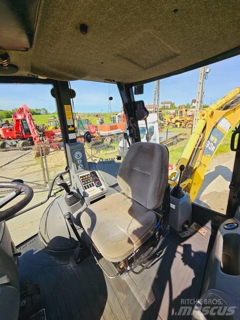 Komatsu WB 93 R لوادر ذات جرافات عكسية