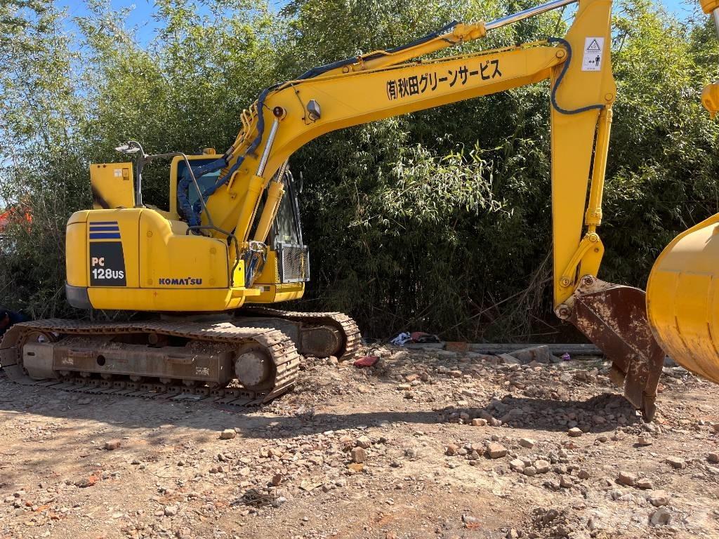Komatsu PC 128 US حفارات وسط 7 طن - 12 طن