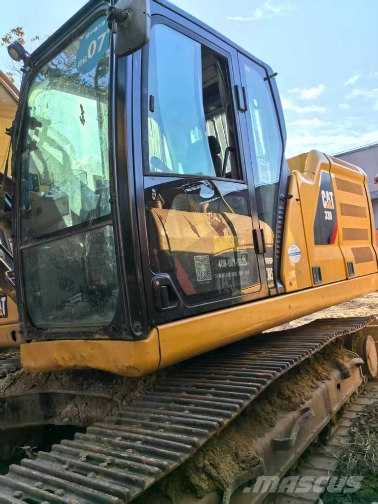 CAT 323 حفارات زحافة