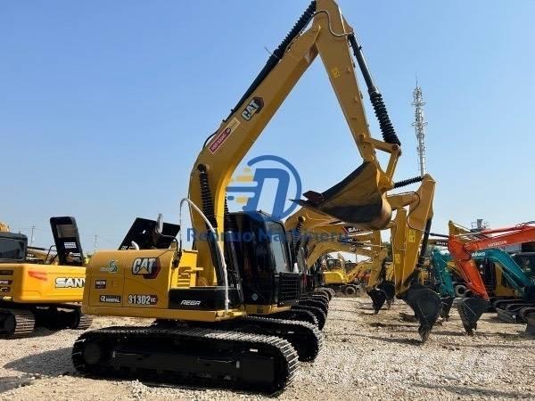 CAT 313 حفارات وسط 7 طن - 12 طن