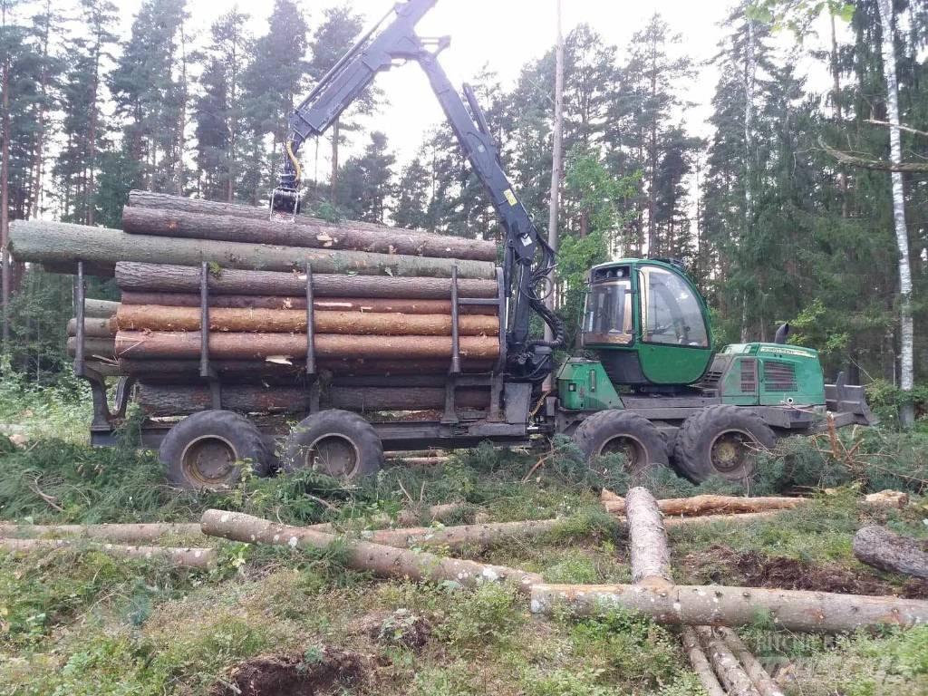 John Deere 1110 E شاحنات
