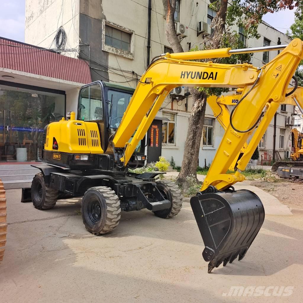 Hyundai 60 W-7 حفارات بعجل