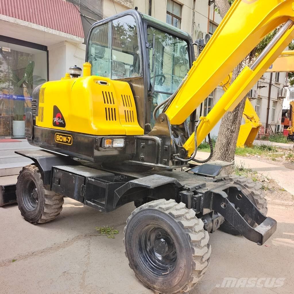 Hyundai 60 W-7 حفارات بعجل