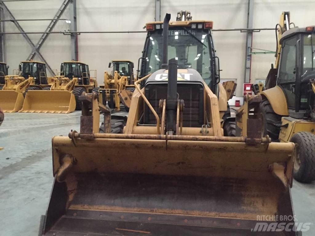 CAT 450 E لوادر ذات جرافات عكسية