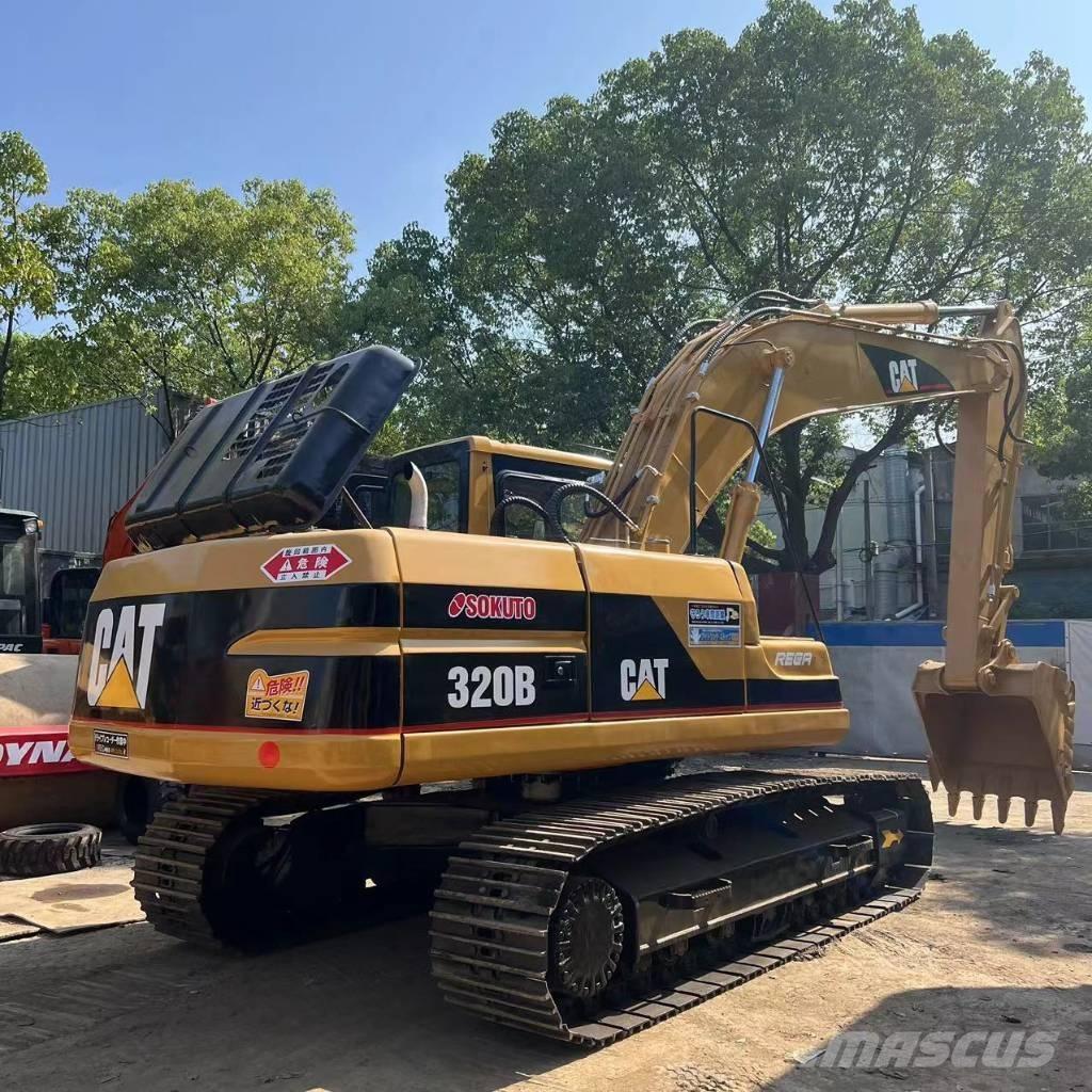 CAT 320 B حفارات زحافة