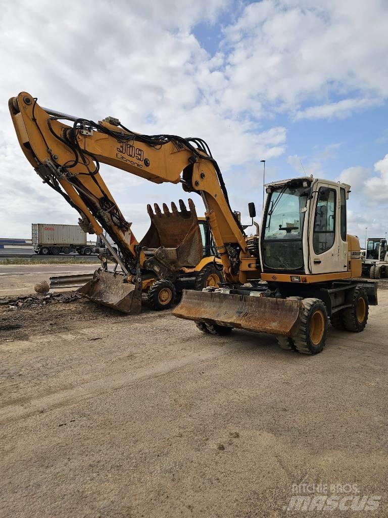 Liebherr A 309 حفارات بعجل