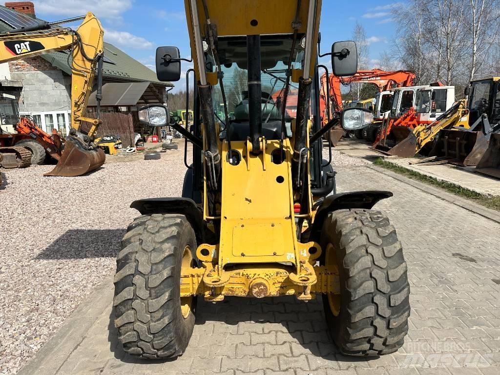 CAT 906 H 2 لوادر بعجل