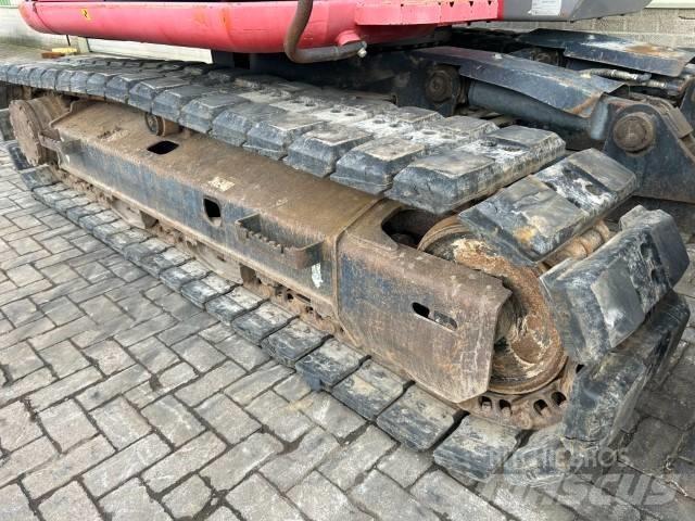 Hitachi ZX 135 US حفارات زحافة