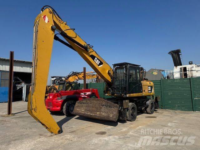 CAT 318D MH مناولات المخلفات / مناولات صناعية
