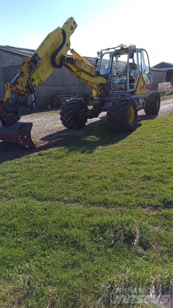 Menzi Muck A91 حفارات بعجل