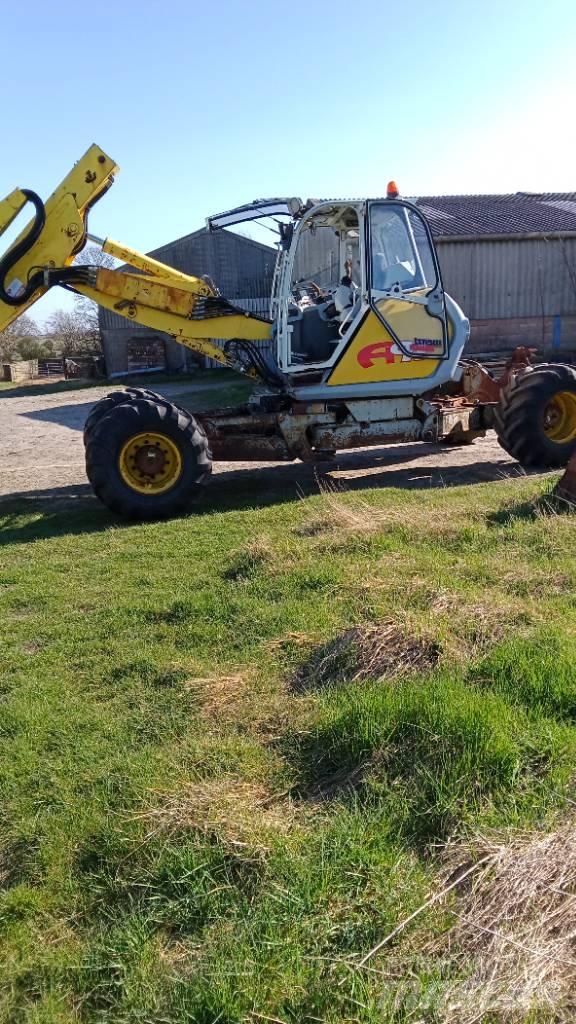Menzi Muck A91 حفارات بعجل
