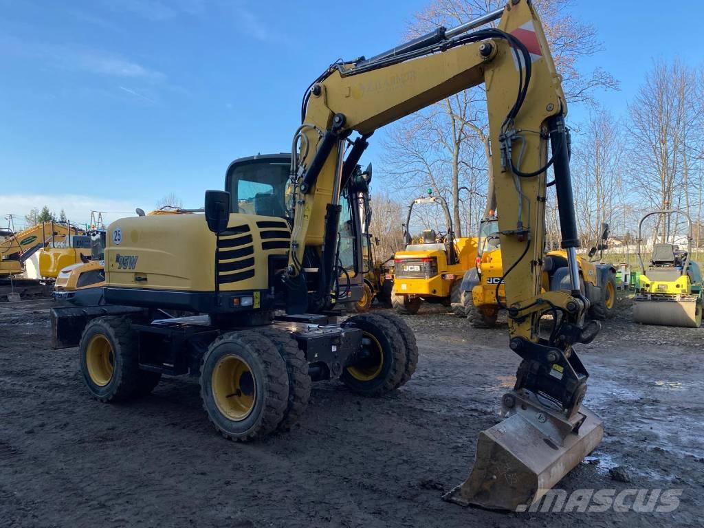 Yanmar B 95 W حفارات بعجل