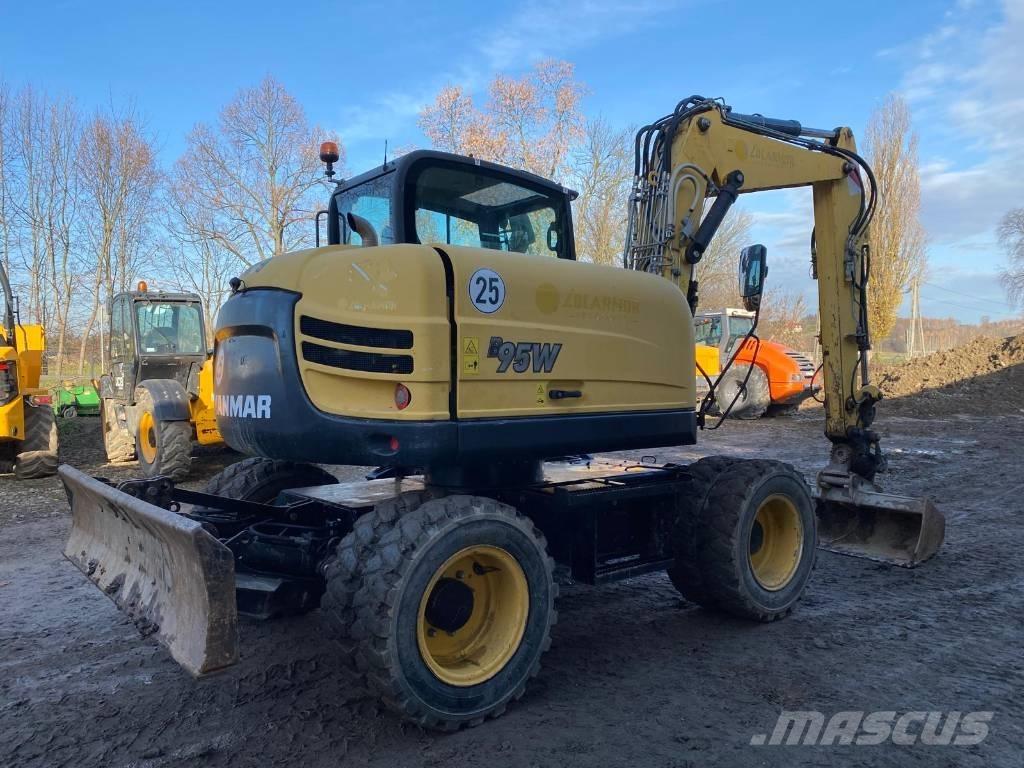 Yanmar B 95 W حفارات بعجل