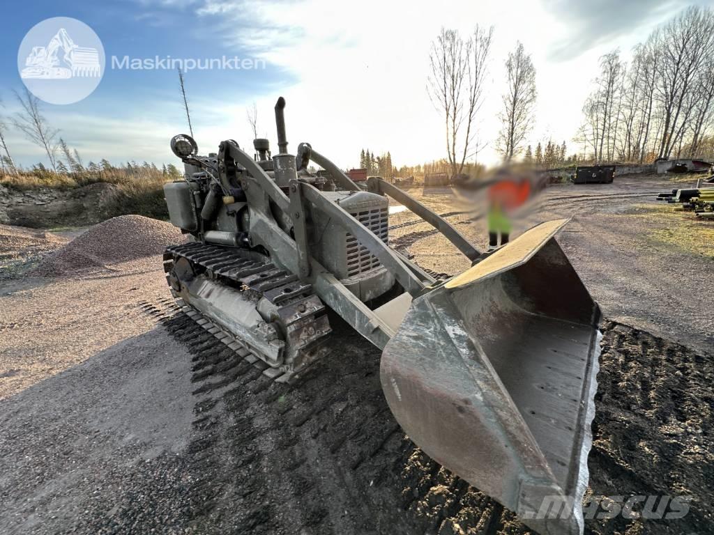 CAT 955 لوادر زحافة