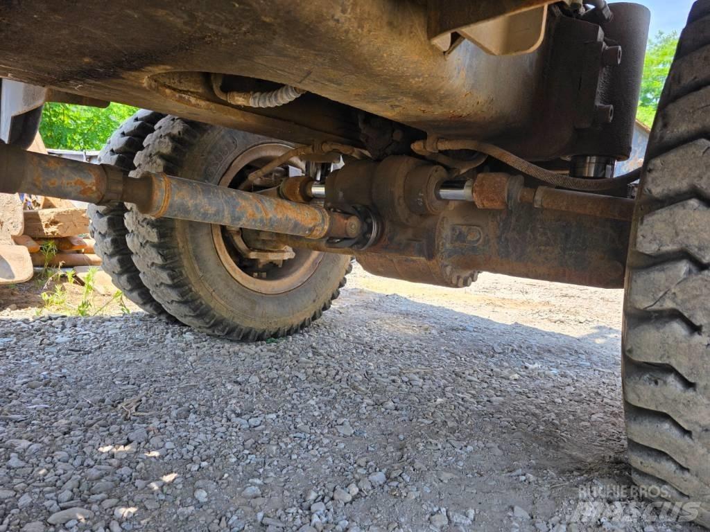 Doosan DX 210 W حفارات بعجل