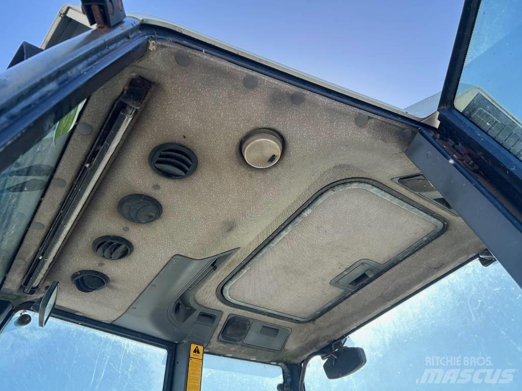 New Holland 7740 الجرارات
