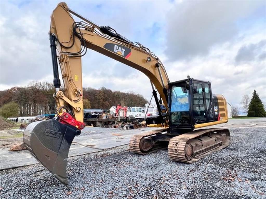 CAT 318EL + HS21 حفارات زحافة