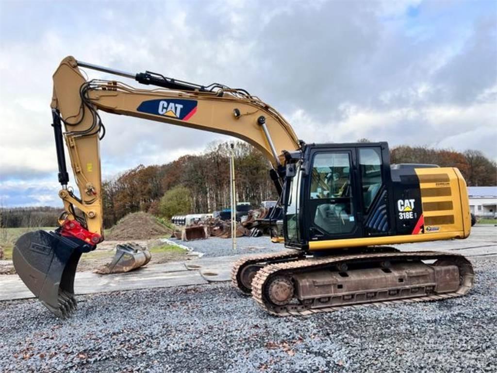 CAT 318EL + HS21 حفارات زحافة