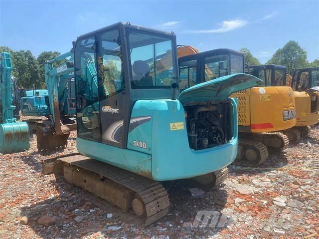 Kobelco sk60 حفارات زحافة