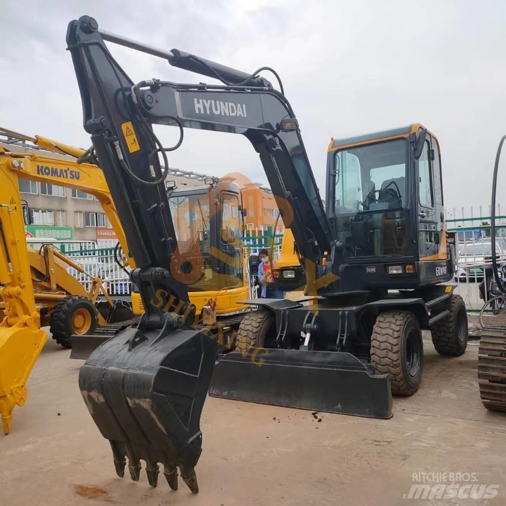 Hyundai 60 W VS حفارات بعجل