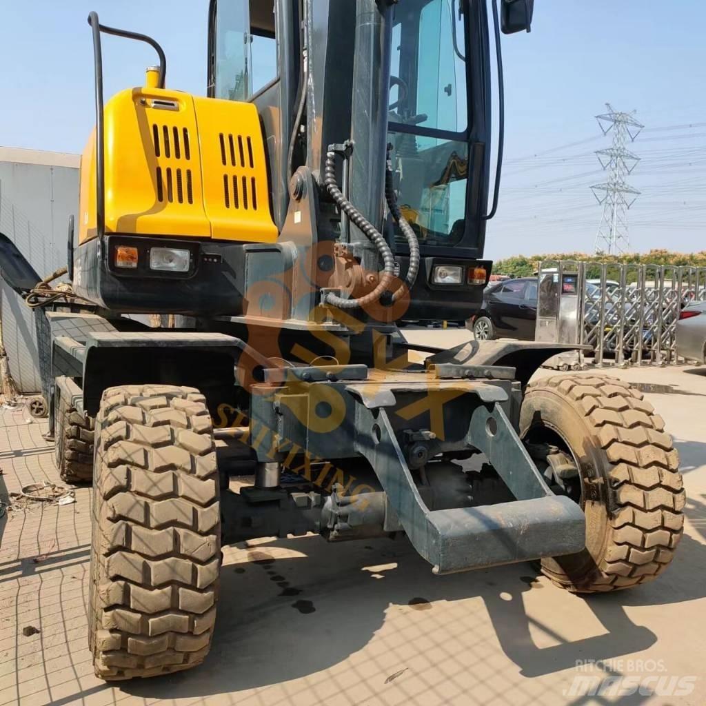 Hyundai 60 W VS حفارات بعجل