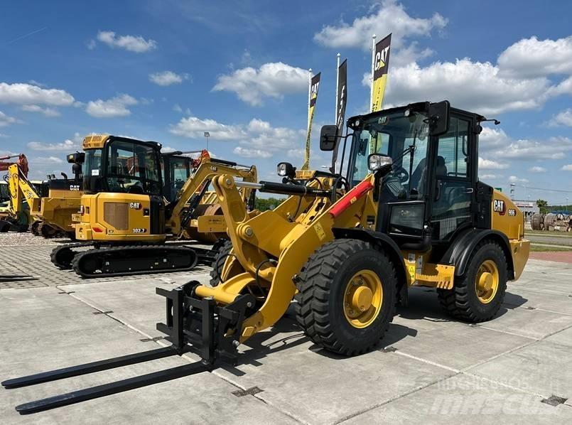 CAT 906 لوادر بعجل