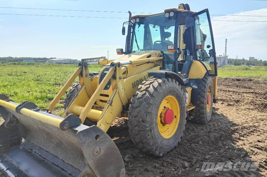 Komatsu WB97S-5E0 لوادر ذات جرافات عكسية