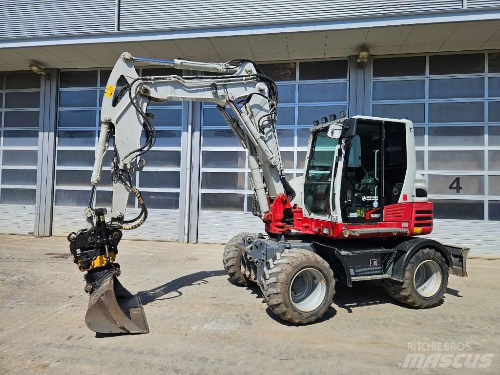 Takeuchi TB295W حفارات بعجل