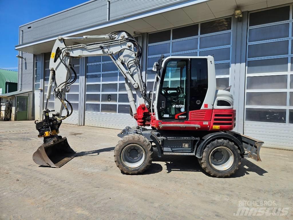 Takeuchi TB295W حفارات بعجل