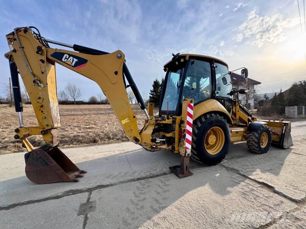 CAT 428 E لوادر ذات جرافات عكسية