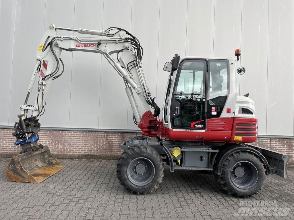 Takeuchi TB295W حفارات بعجل