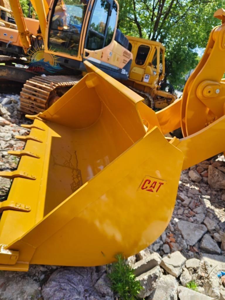 CAT 966H لوادر بعجل