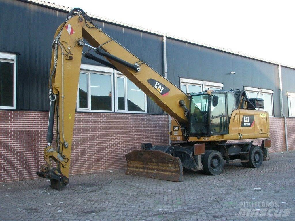 CAT MH3024 مناولات المخلفات / مناولات صناعية