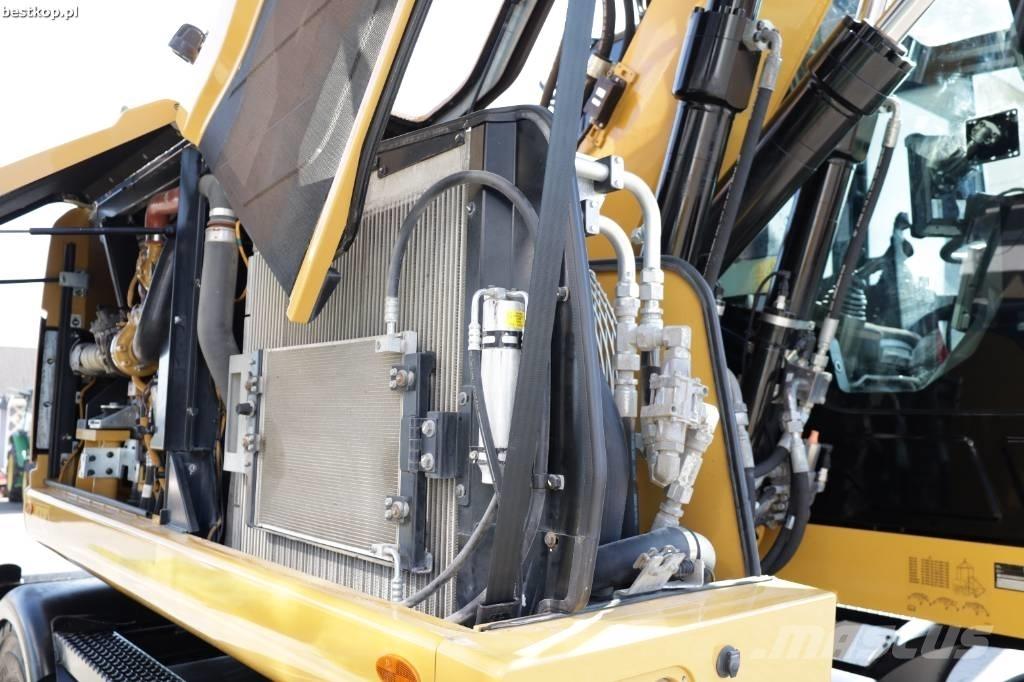 CAT M 315 F حفارات بعجل