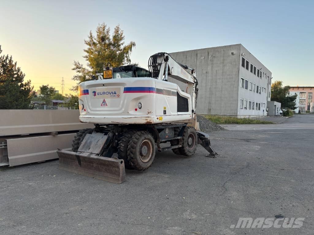 CAT m314f حفارات بعجل