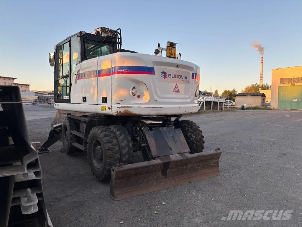CAT m314f حفارات بعجل