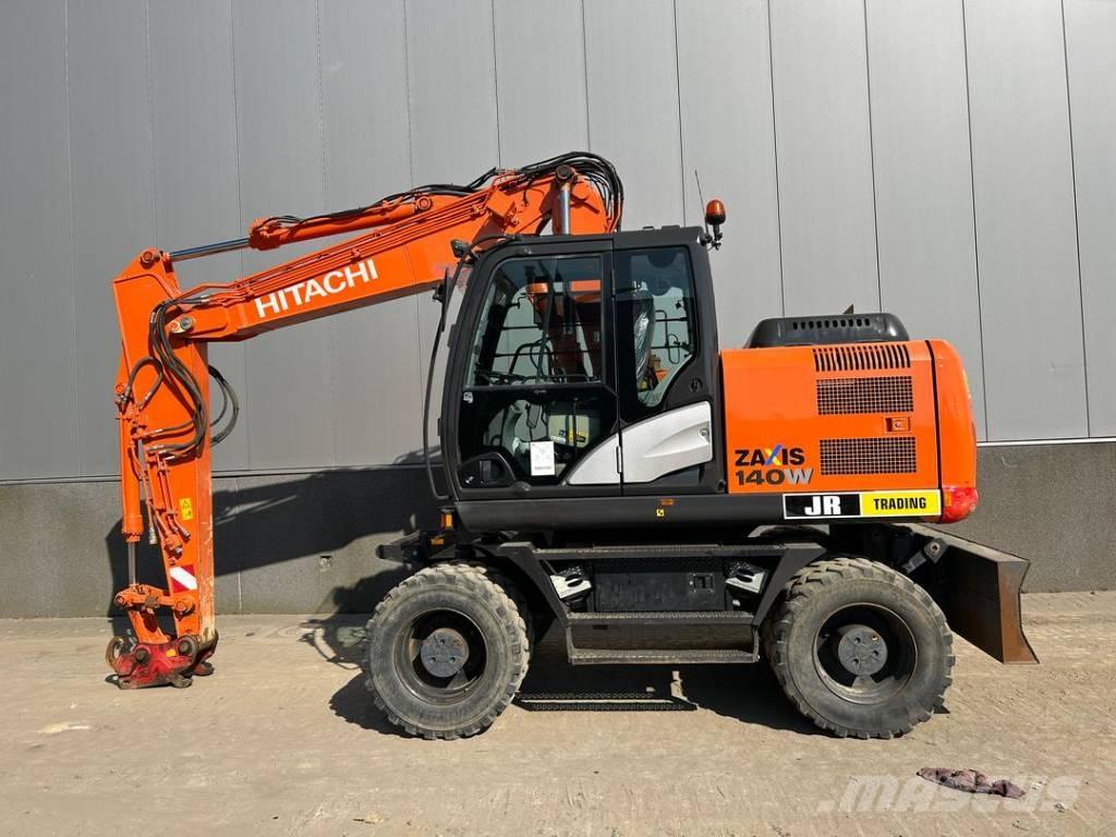 Hitachi ZX 140 W-5B حفارات بعجل