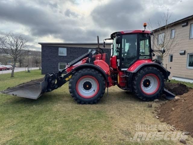 Huddig 1260 C لوادر ذات جرافات عكسية