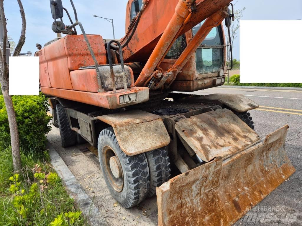 Doosan DX210WA حفارات بعجل
