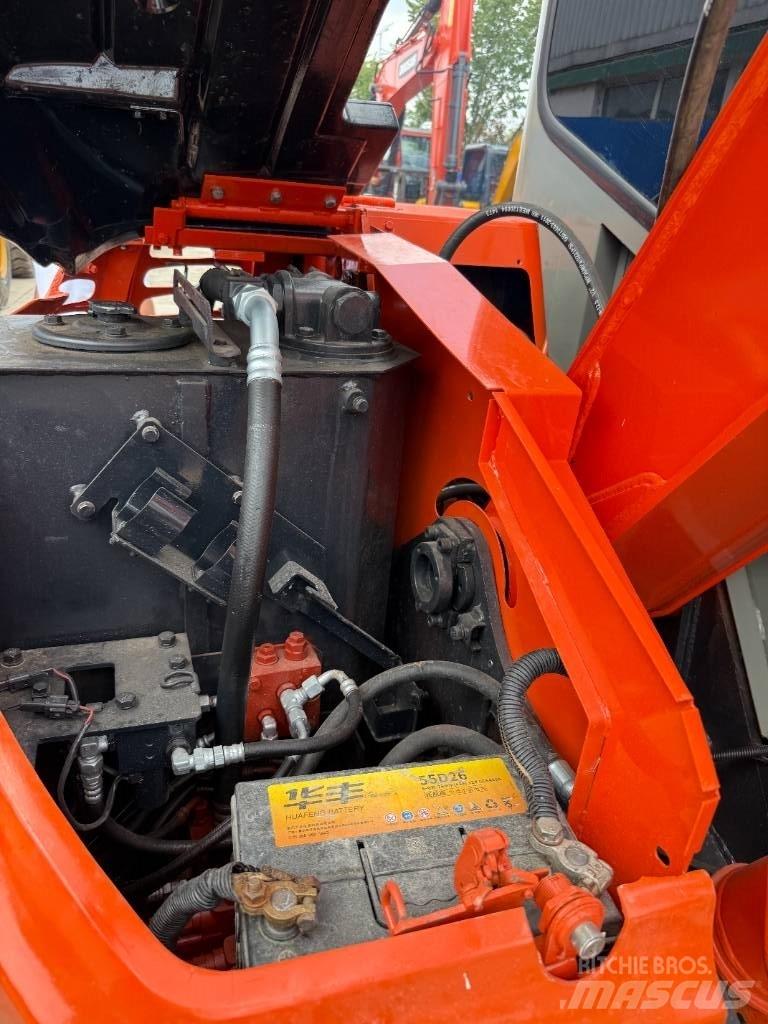 Hitachi Zaxis 55 U حفارات زحافة