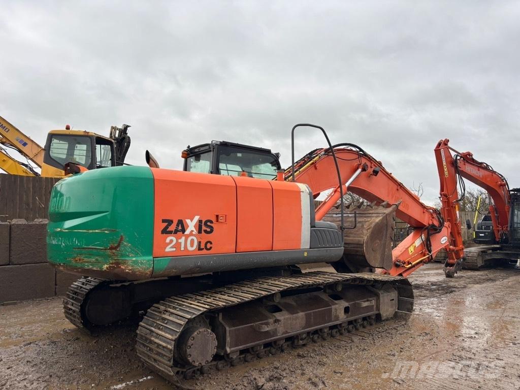 Hitachi zx210 حفارات زحافة
