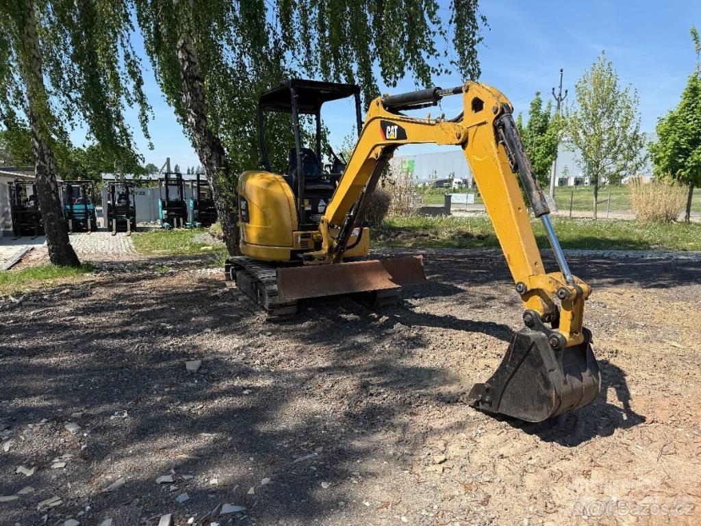 CAT 303 E CR حفارات زحافة