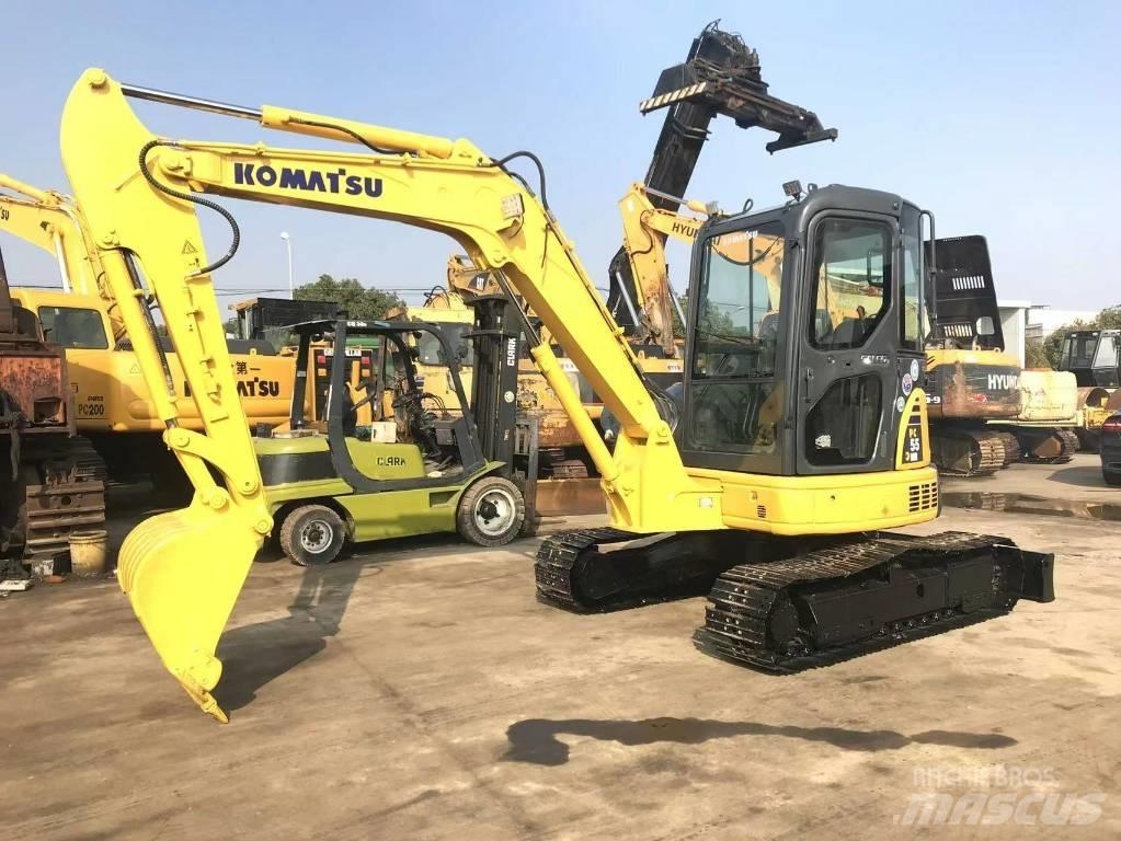 Komatsu PC 55 حفارات زحافة