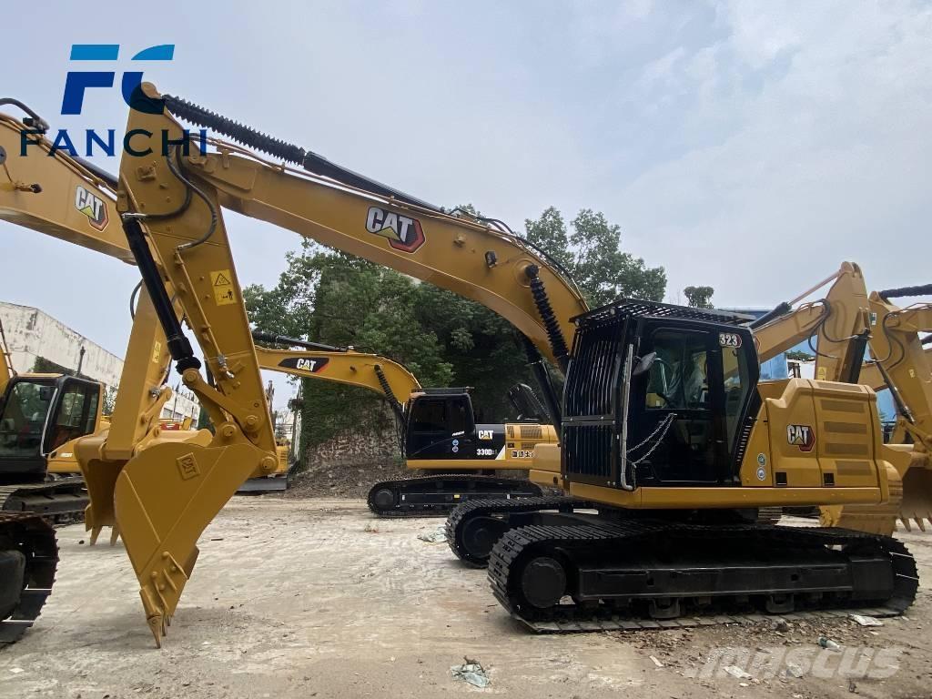 CAT 323 حفارات وسط 7 طن - 12 طن