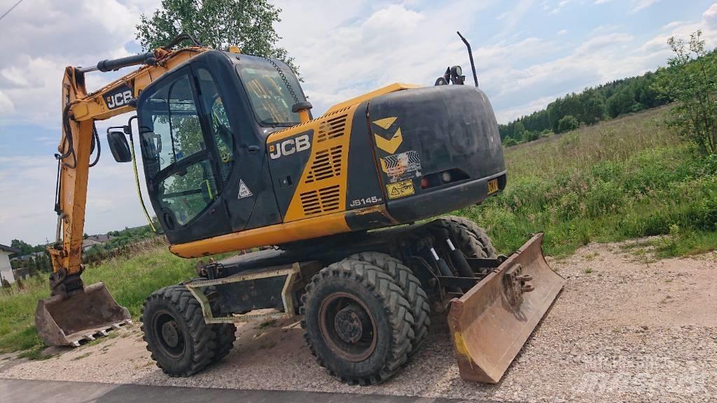 JCB JS 145 W حفارات بعجل