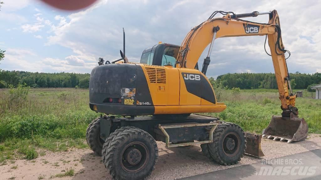 JCB JS 145 W حفارات بعجل