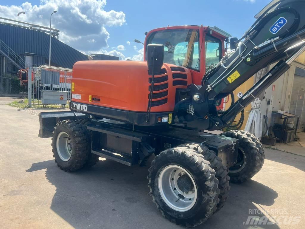 Schaeff TW 110 حفارات بعجل
