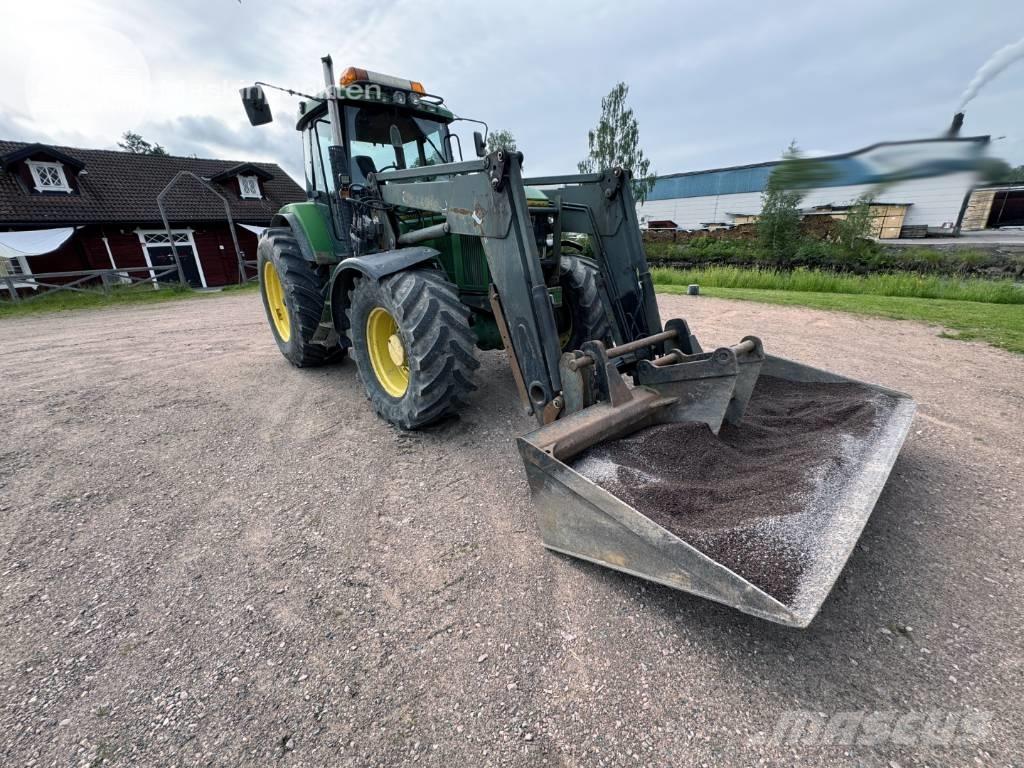 John Deere 7600 الجرارات
